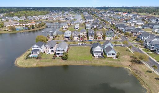 Bird's eye view with a water view and a residentia