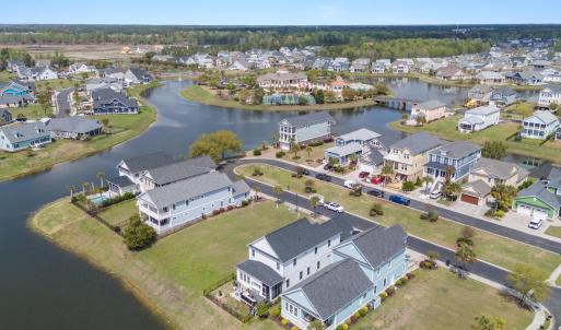 Bird's eye view with a water view and a residentia