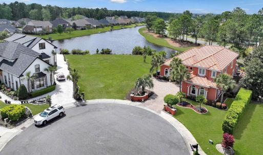 Bird's eye view with a water view and a residentia