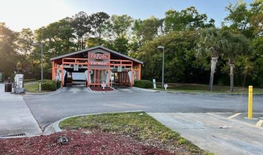 View of road with street lighting and driveway