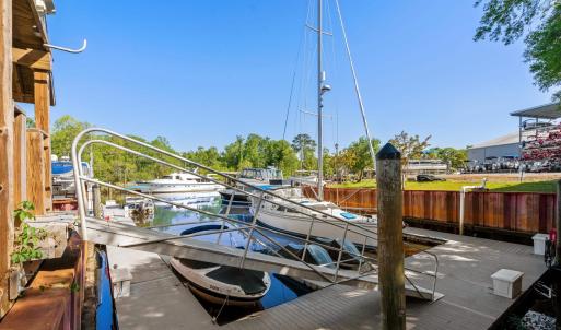 Dock area featuring boat lift