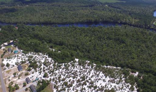 Aerial view of property and surrounding area featu