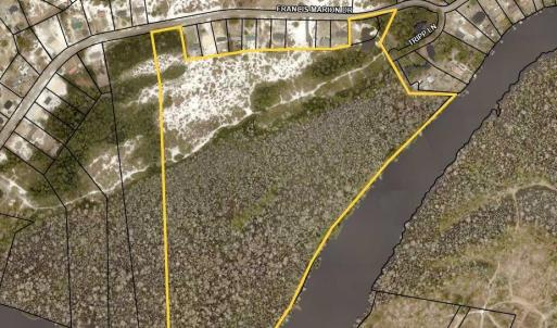 Aerial map of property and surrounding area featur