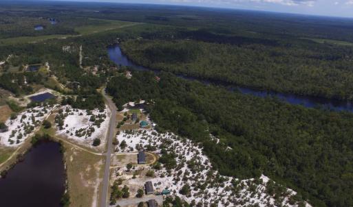 Aerial view of property and surrounding area featu