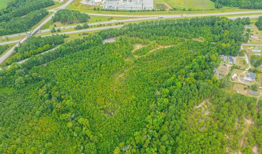 Aerial view of property's location with a heavily