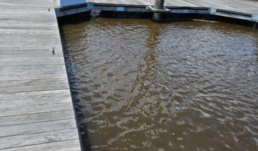 Dock featuring a water view