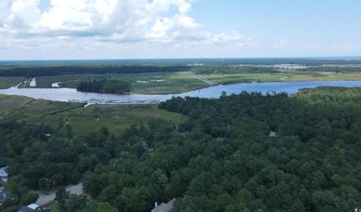 Drone / aerial view of a large body of water and a