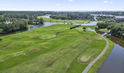 Aerial view of a large body of water and a local g