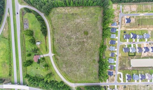 Aerial view of sparsely populated area with proper