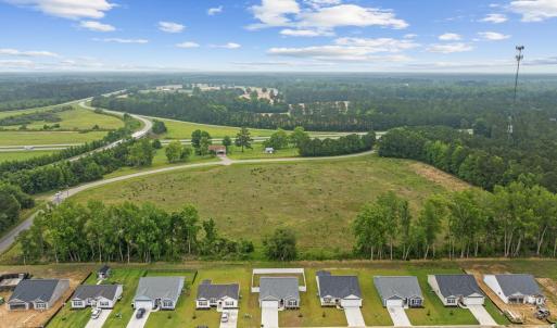 View of property location with a forest