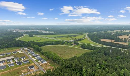 Aerial view of sparsely populated area with proper