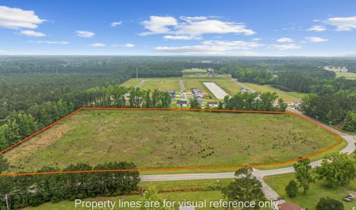 Aerial view of sparsely populated area featuring a