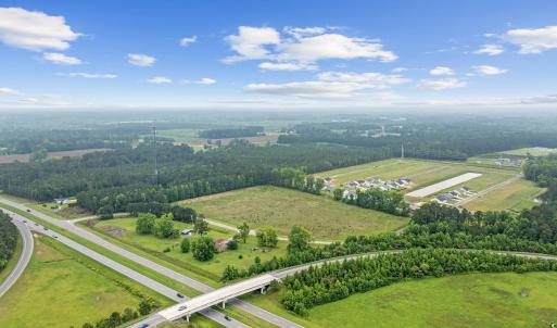 View of property location featuring a heavily wood
