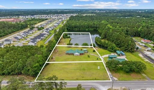 Aerial view of property's location with property p