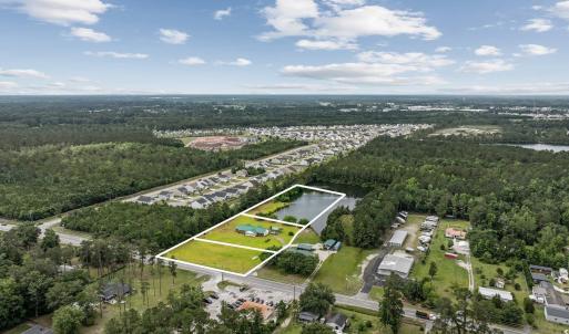 View of property location featuring a heavily wood