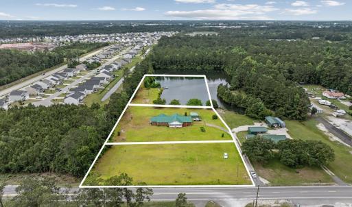 Aerial overview of property's location with proper