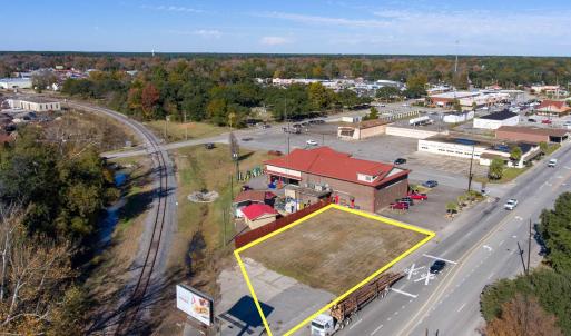 Aerial overview of property's location with proper