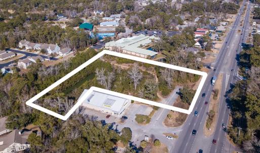 Aerial view of property and surrounding area featu