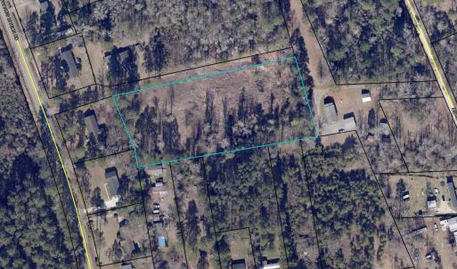 Aerial view of property's location with property p