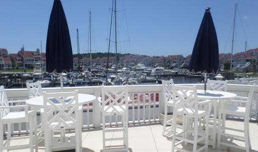 View of patio featuring a water view