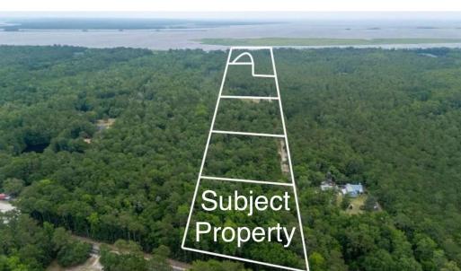 Aerial view of property's location featuring a for