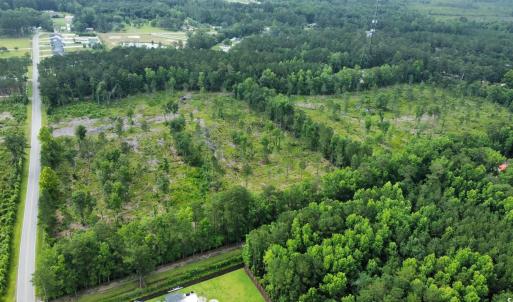 Aerial view of property and surrounding area featu