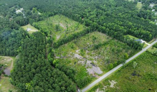 View of property location featuring a heavily wood