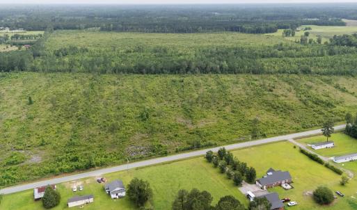 Aerial view of property and surrounding area with