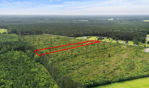 Aerial overview of property's location with a fore