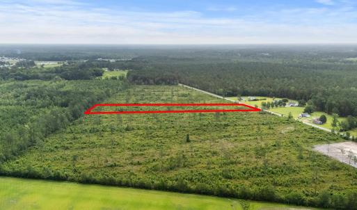 View of property location featuring a heavily wood