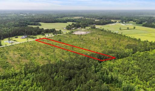 View of rural area featuring a heavily wooded area