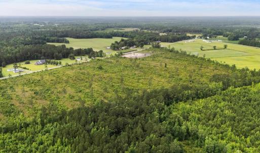 View of rural area featuring a heavily wooded area