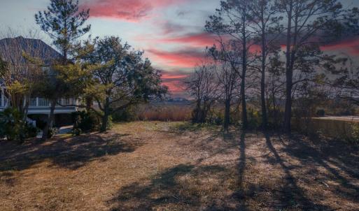 Yard at dusk featuring a mountain view