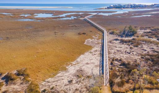 View of property location with a nearby body of wa