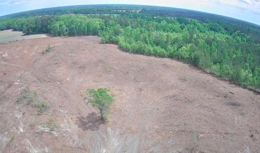 Aerial view of property and surrounding area featu