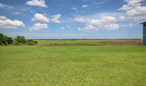 View of yard with a rural view
