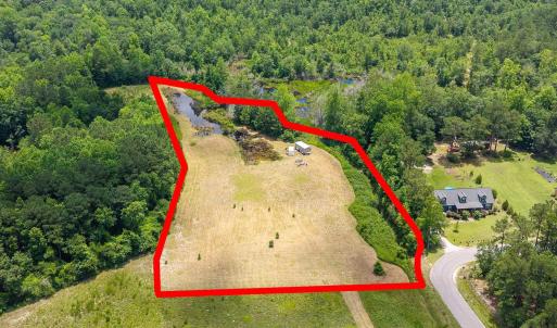 Aerial view of property and surrounding area featu