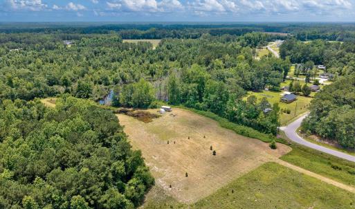 Aerial view of property and surrounding area with