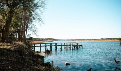 Dock featuring a water view