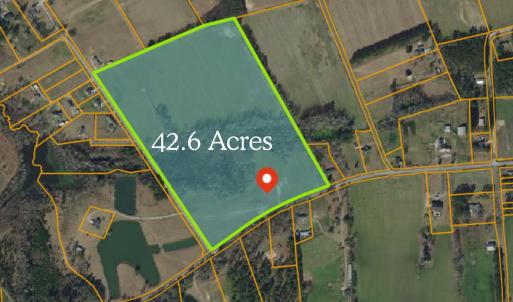 Aerial map of property and surrounding area featur
