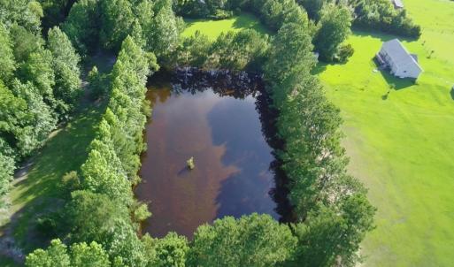 View from above of property featuring a nearby bod