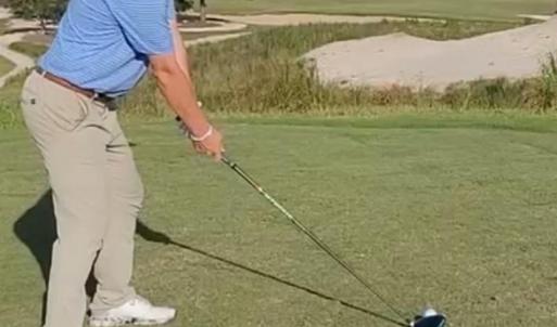 View of home's community with view of golf course,