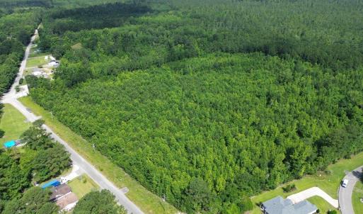 Aerial view of property and surrounding area featu