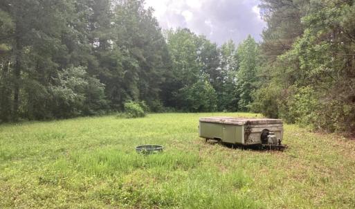 View of yard with a wooded view