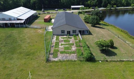Aerial view of property and surrounding area featu