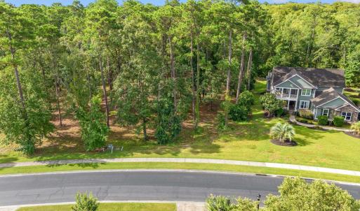 Aerial view of property and surrounding area with