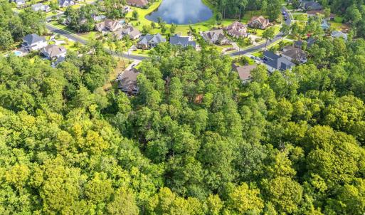 Aerial view of property and surrounding area with