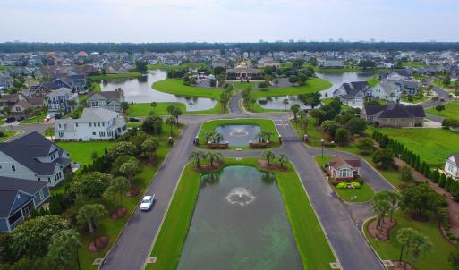 Aerial view of residential area featuring a nearby