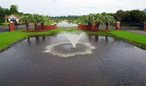 Aerial view of property's location with a large bo
