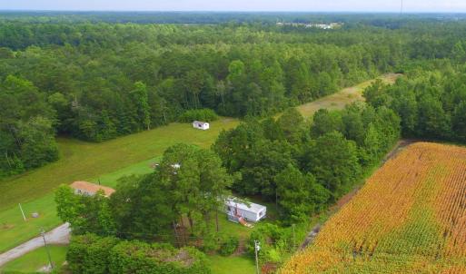 View of rural area with a heavily wooded area